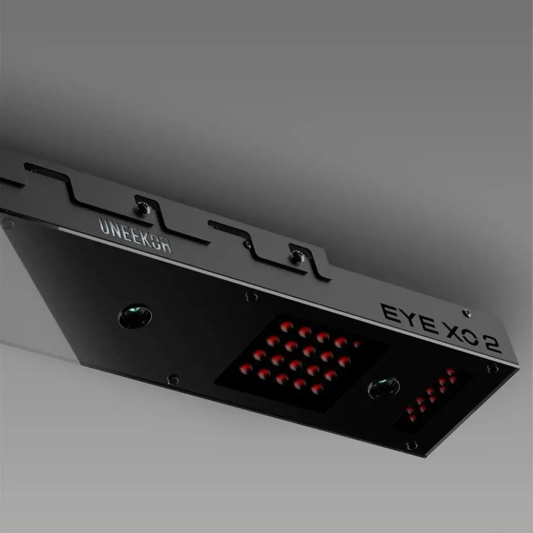 Uneekor EYE XO2 overhead launch monitor installed in a premium golf simulator