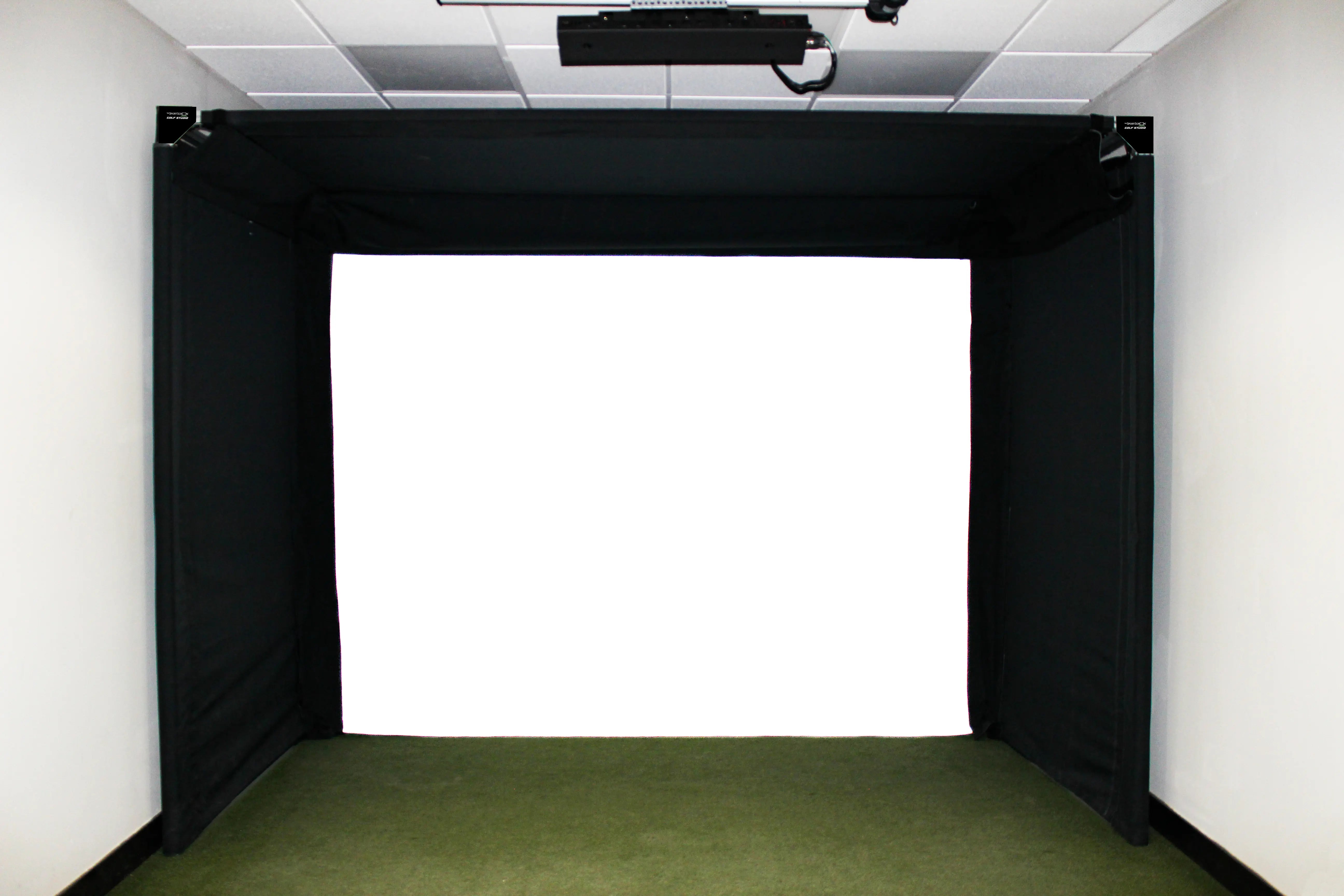 Front view of an installed SportScreen Parlour 11 golf simulator enclosure