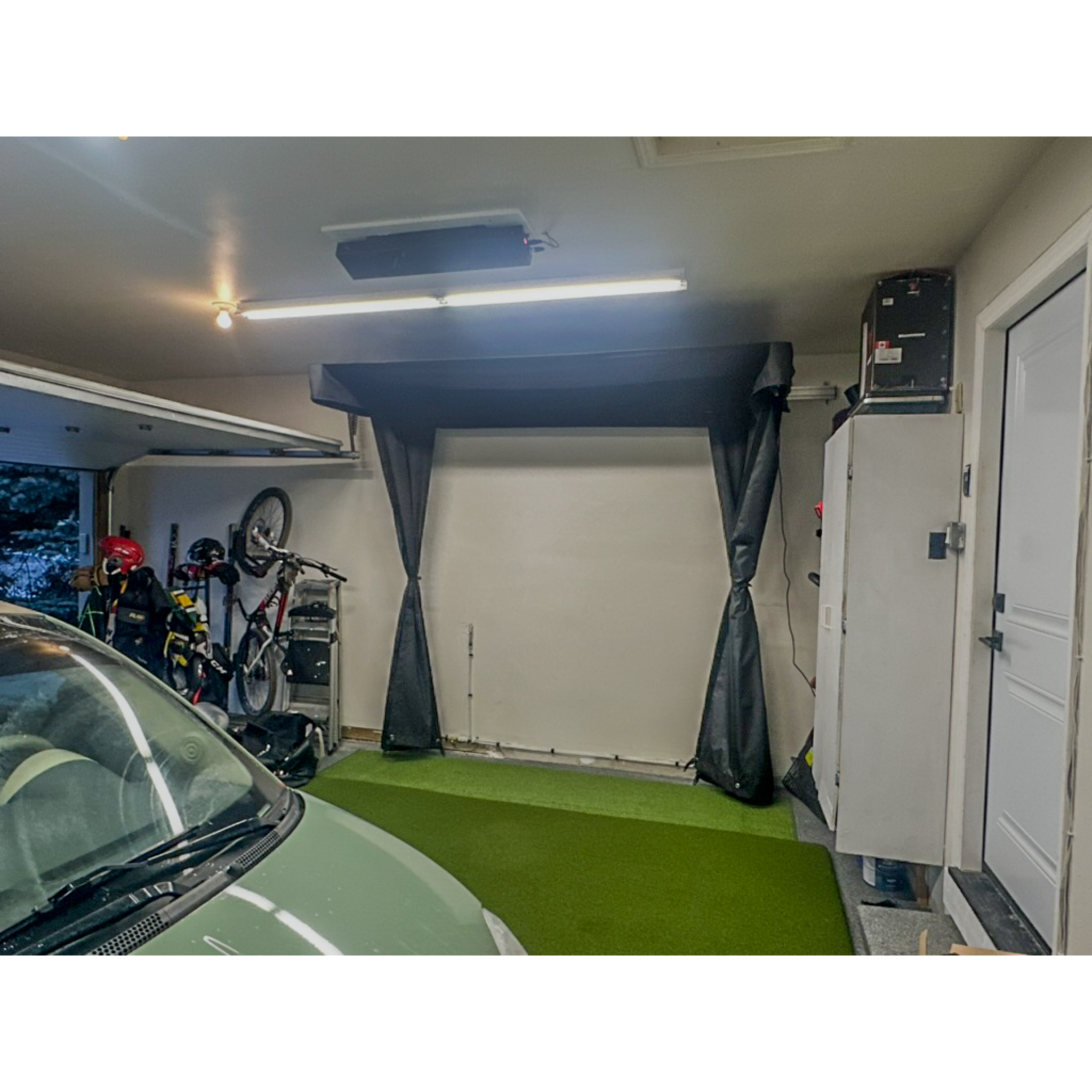 The SportScreen Vanish LITE Golf Simulator Enclosure