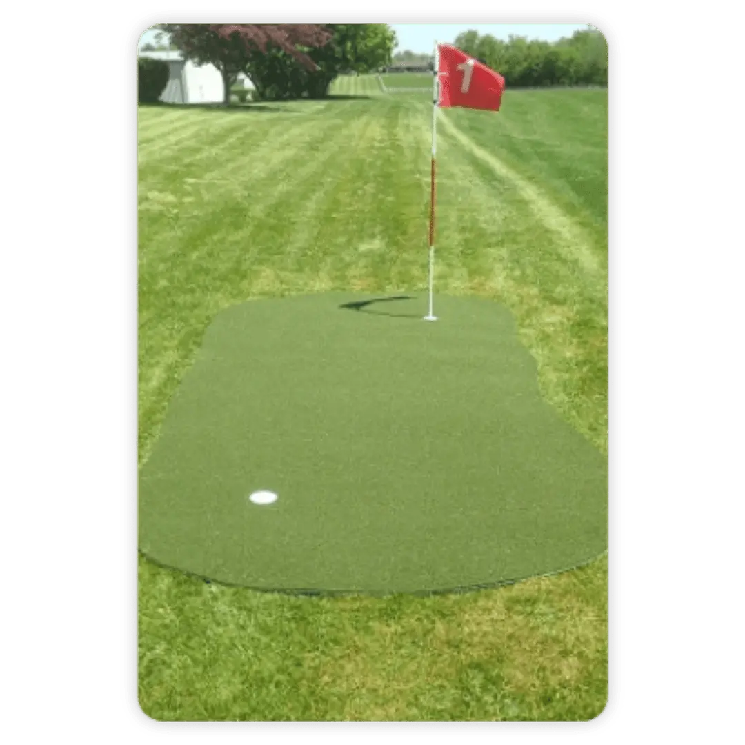 Big Moss Outdoor 615 Target Putting Green with a putting hole and a red flag labeled 1 on green turf