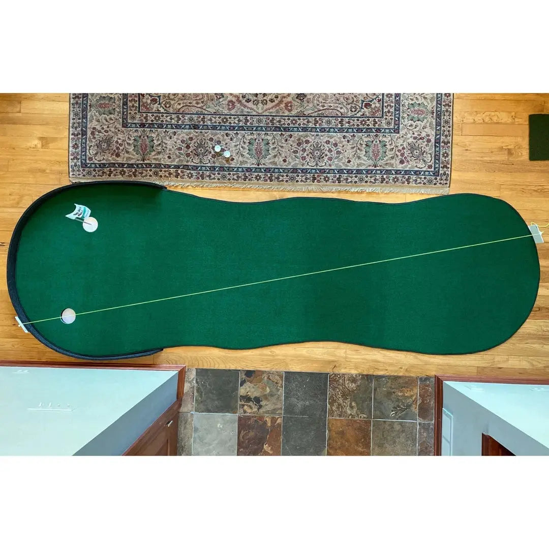 Top-down view of Big Moss The Augusta 410 Putting Green 2 Hole with a golf ball, flag, and yellow guideline visible