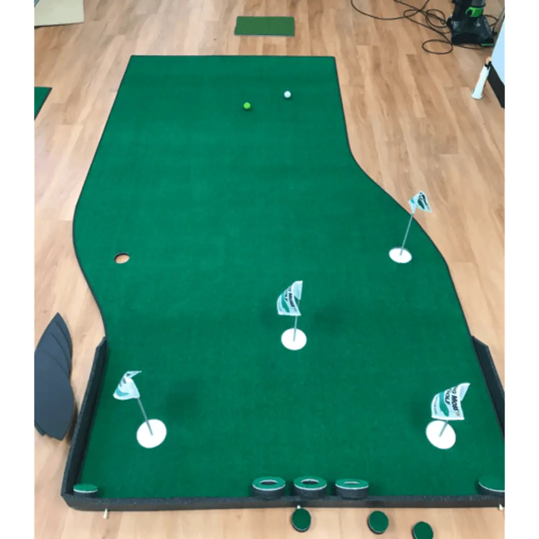 Big Moss The Natural Putting Green with curved putting surface, golf flags, golf balls, and lifelike turf for indoor use