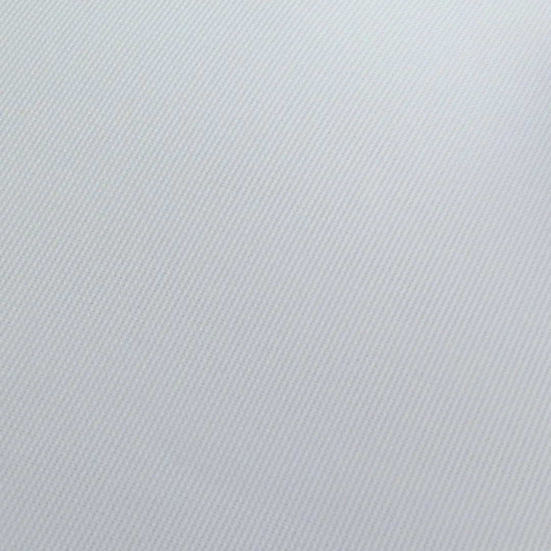 Close-up of golf impact screen's white textured surface with visible diagonal lines